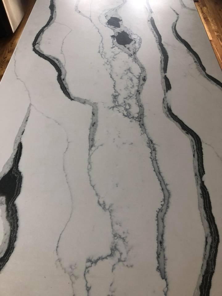 White quartz slab with bold dark veining